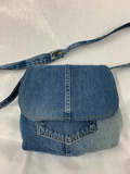 The waist band becomes the strap, pockets relocated for holding your phone, keys  and more